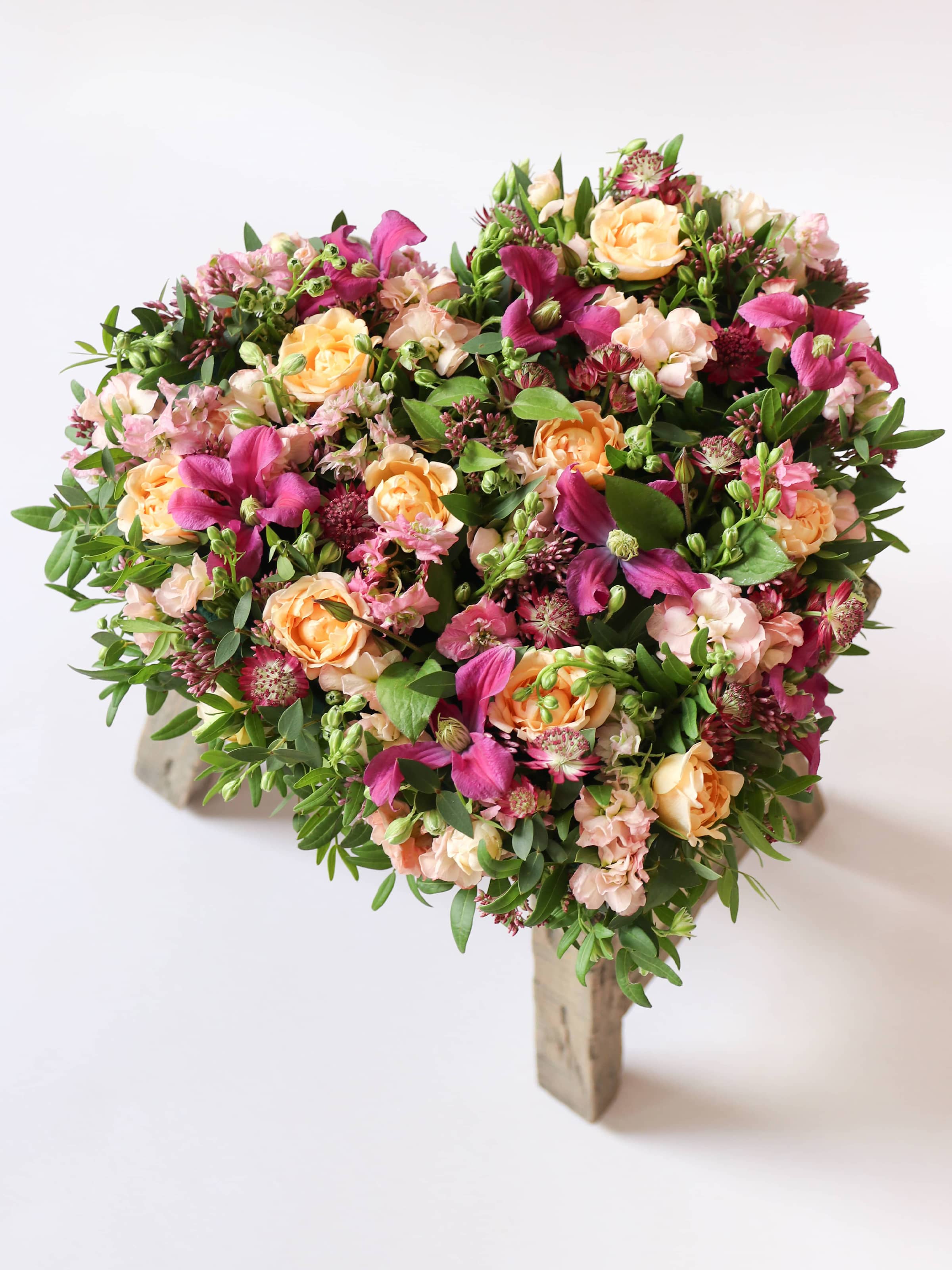 Bright & Vibrant Funeral Heart Posy