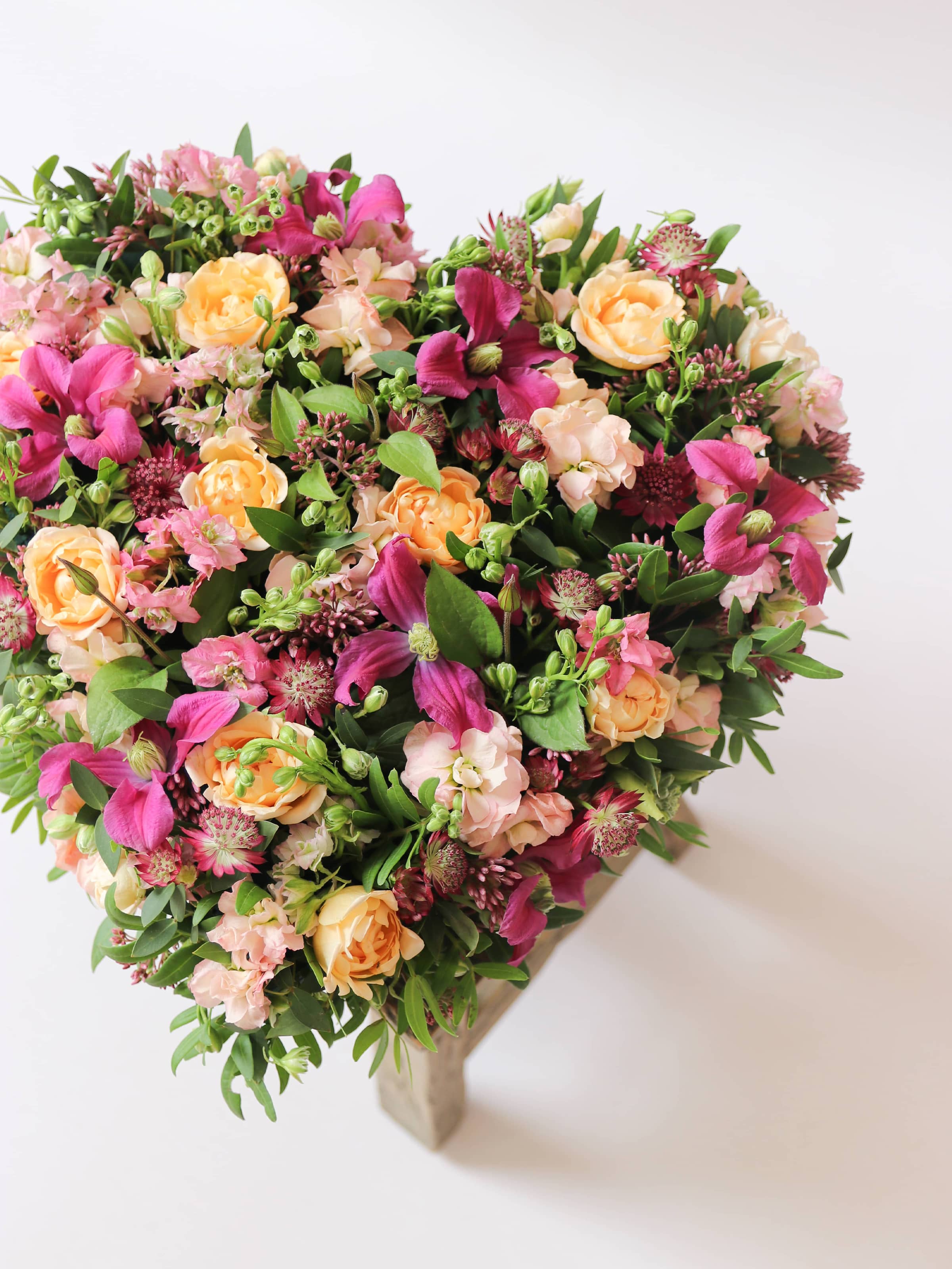 Bright & Vibrant Funeral Heart Posy