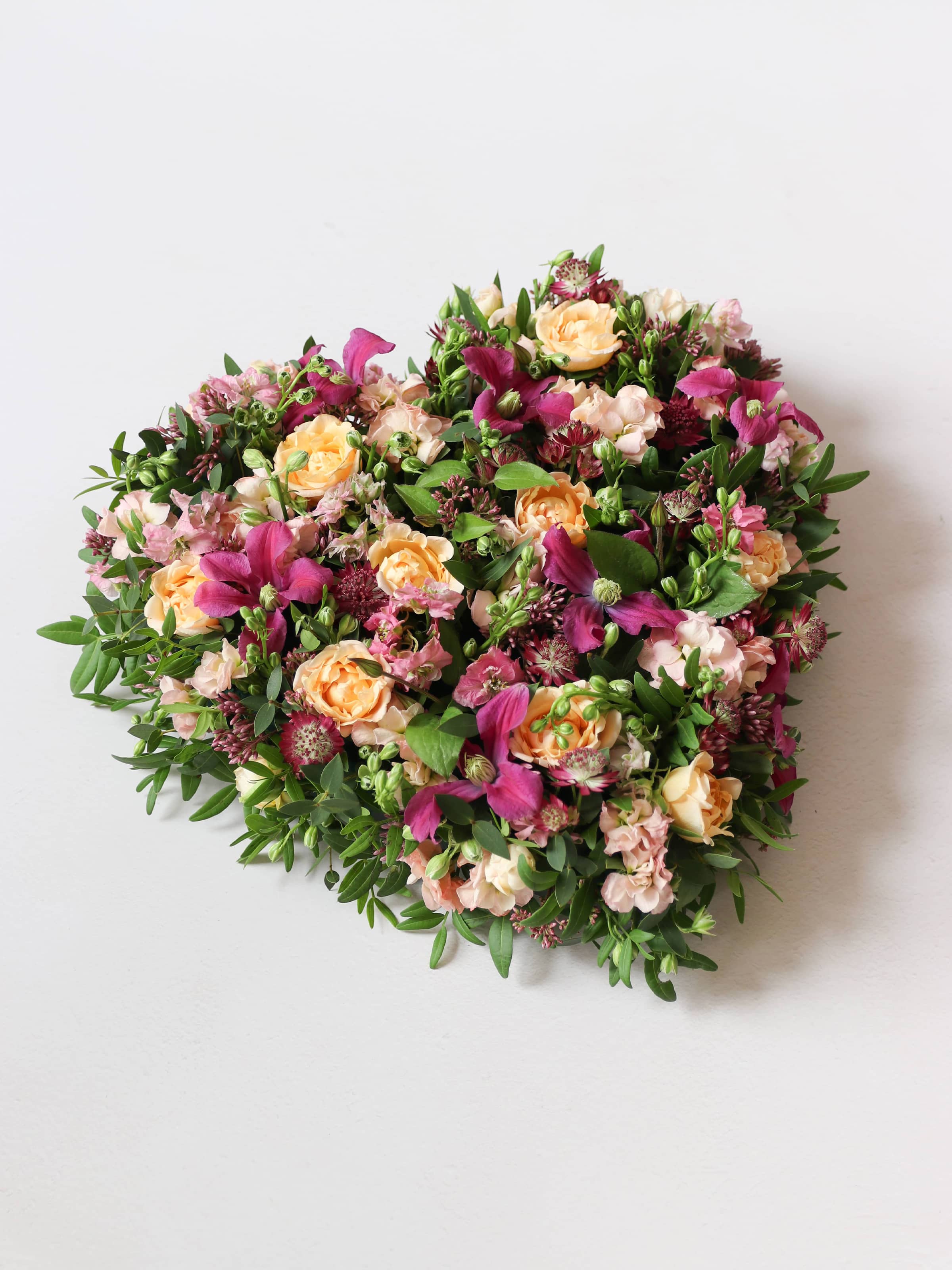 Bright & Vibrant Funeral Heart Posy