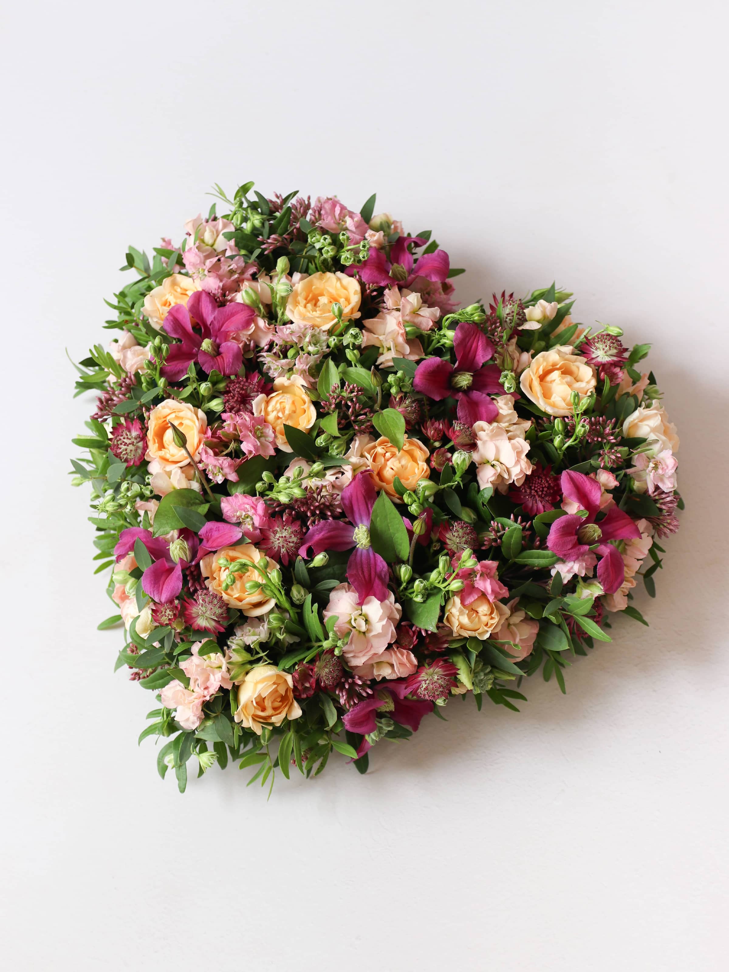Bright & Vibrant Funeral Heart Posy