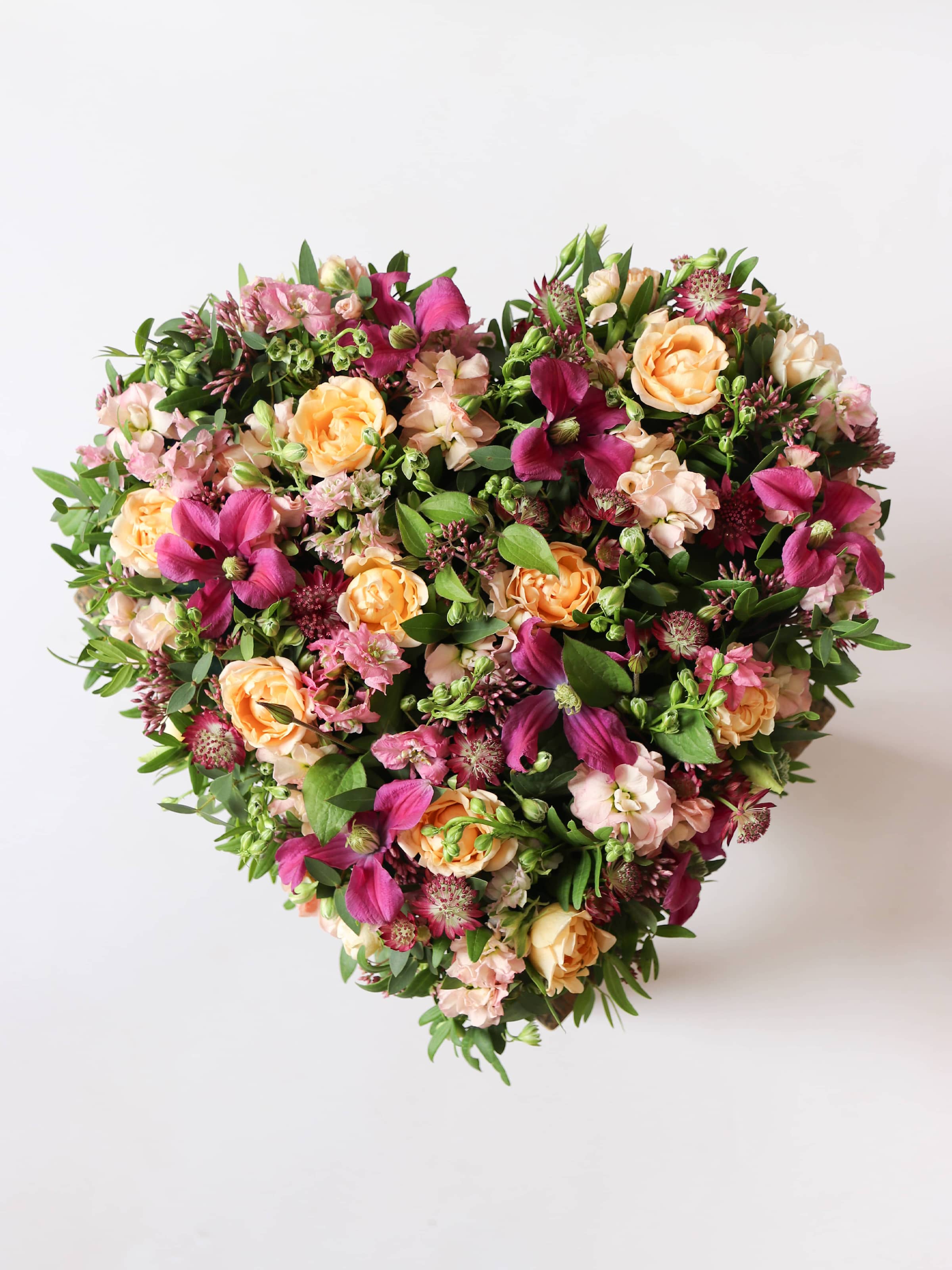 Bright & Vibrant Funeral Heart Posy