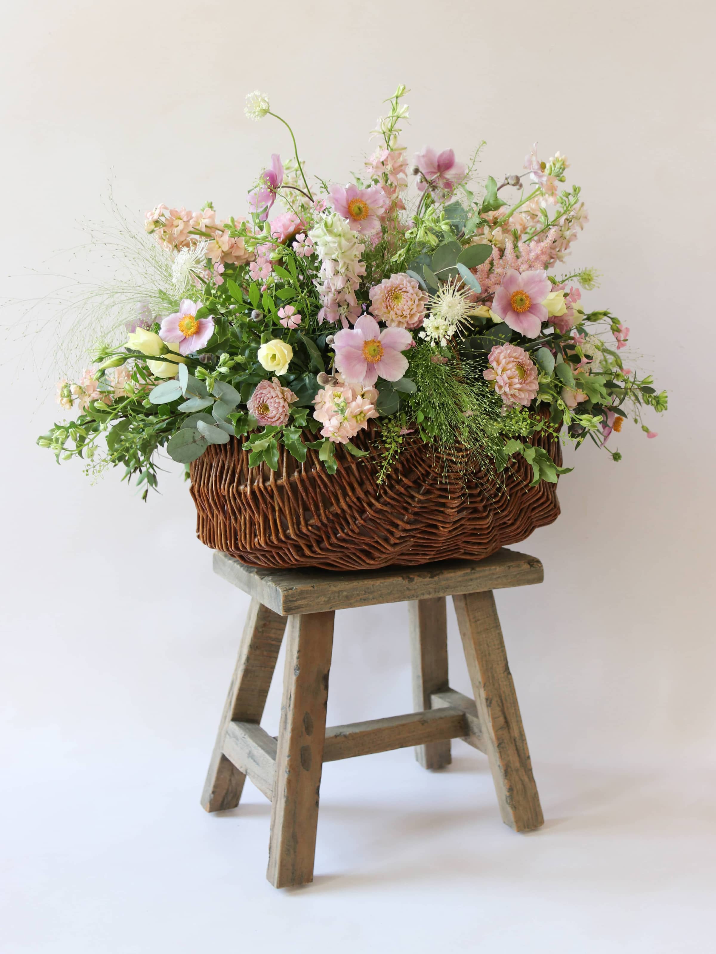 Pastel Basket Flower Arrangement