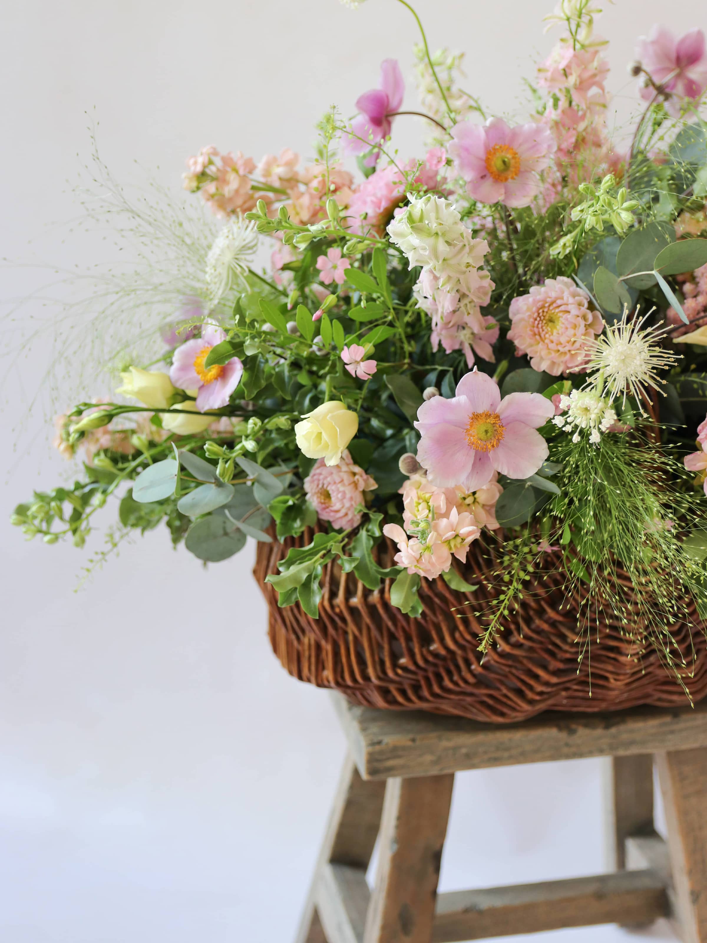 Pastel Basket Flower Arrangement